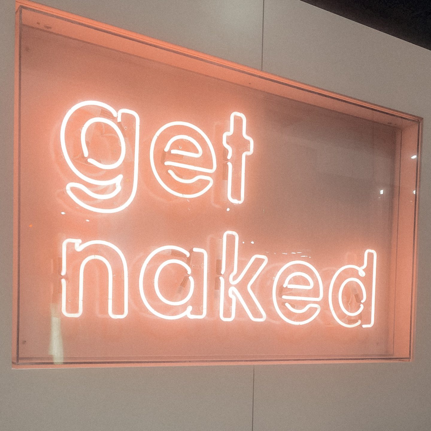 Get Naked Neon Sign
