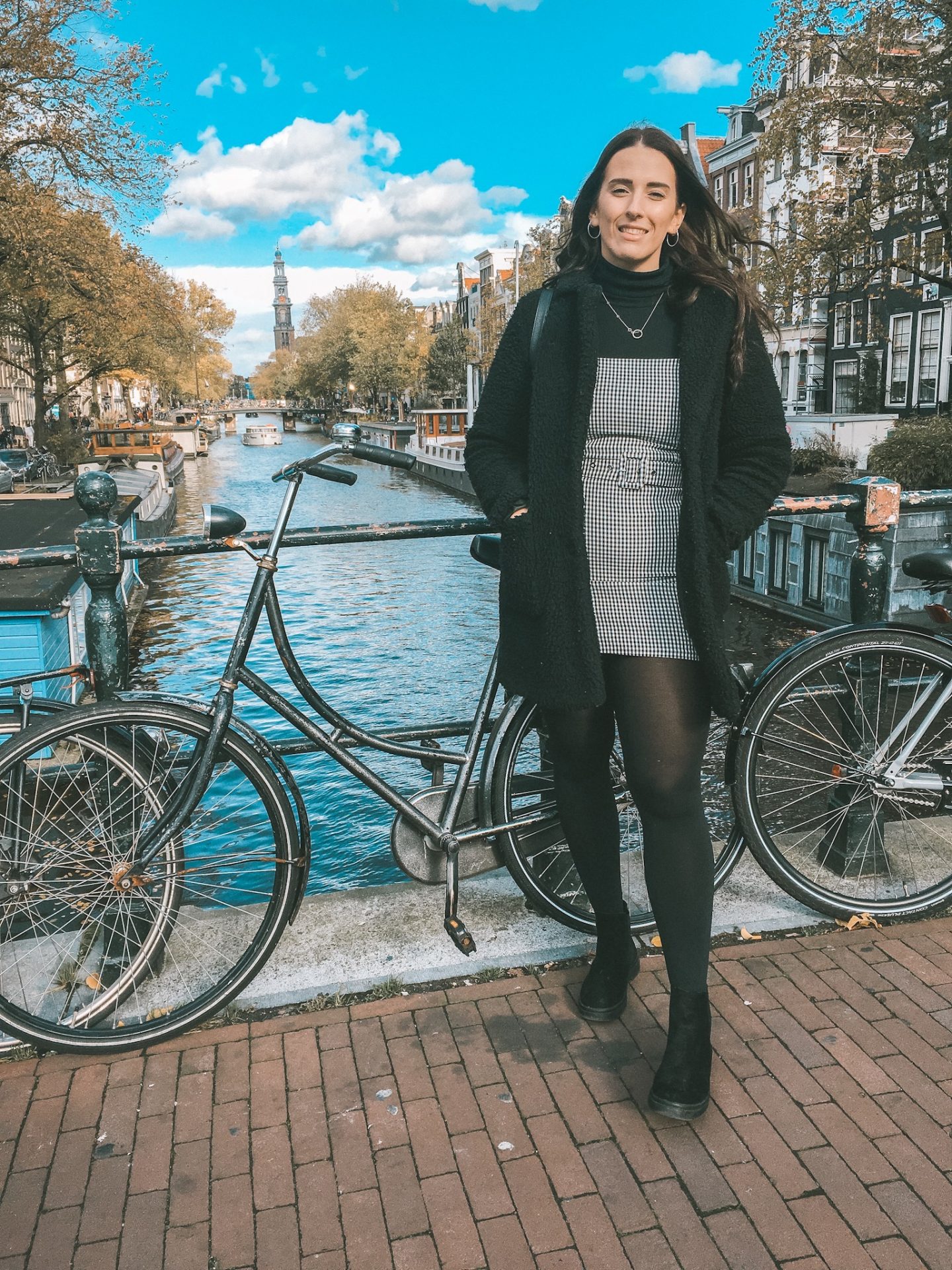 Girl at the canals in Amsterdam